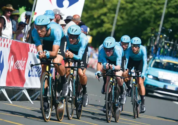  ??  ?? above Team Astana on Stage 3 of the Tour de France