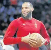  ?? KATHY WILLENS/AP ?? “We all know how much more he is than basketball,” LeBron James, above, says of Dwyane Wade’s activism.