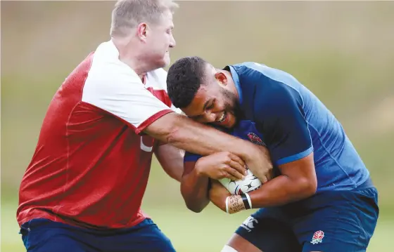  ?? PICTURE: Getty Images ?? Promotion: New head coach Neal Hatley, here on England duty with Lewis Ludlam, is responsibl­e for Bath’s on-field perfomance