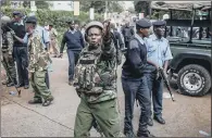  ?? PICTURE: LUIS TATO/AFP/GETTY. ?? OPERATION: Kenyan security forces clear the entrance to the scene after the attack in the Westlands suburb.