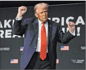  ?? ?? Charlie Neibergall The Associated Press Former President Donald Trump dances on stage during a commit to caucus rally Sunday in Sioux City, Iowa. “There’s no way Iowa is voting against Trump,” he said.