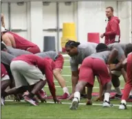  ?? NWA Democrat-Gazette/J.T. Wampler ?? HEAD HOG: Razorback head coach Chad Morris watches his squad run drills with no pads at practice Wednesday. The team has another contact practice session set for today leading into Saturday’s scrimmage.