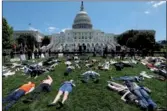  ?? KEVIN LAMARQUE / REUTERS ?? Activists mark the second anniversar­y of the Pulse Nightclub shooting, where a gunman killed 49 people in Orlando, at the US Capitol in Washington, on Tuesday.