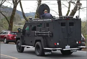  ?? AP Photo/Ben Margot ?? Hostage: An armored vehicle arrives at the Veterans Home of California in Yountville, Calif., on Friday. A gunman took at least three people hostage at the largest veterans home in the United States on Friday, leading to a lockdown of the sprawling...