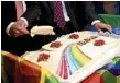  ?? PHOTO: BRITTA PEDERSEN/DPA ?? CUT OF THE ACTION: Annastacia Palaszczuk believes businesses will be lining up to make cakes for same-sex weddings.