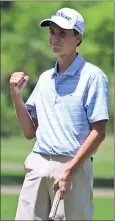  ??  ?? Jeremy Stewart / RN-T
Adrian Kramer, a sophomore from Oviedo, Fla., pumps his fist after sinking his putt on the 18th hole during the final round of the Rome Junior Classic at Coosa Country Club.