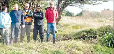  ??  ?? From left, Gail Smith, Daniel Fearon and Shane Whaanga from Harbourvie­w Rest Home, Mana MP Kris Faafoi and his assistant James Baigent at the site of Bowlers Wharf.