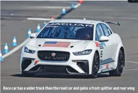  ??  ?? Race car has a wider track than the road car and gains a front splitter and rear wing