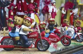  ??  ?? Bear-y cute: Bears on Coca-Cola bikes