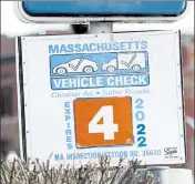  ?? NICOLAUS CZARNECKI / BOSTON HERALD ?? A vehicle inspection location displays an April 2022 sticker but drivers still aren’t able to get an inspection. The RMV said drivers with expired stickers should plan ‘to obtain inspection by the end of April.’