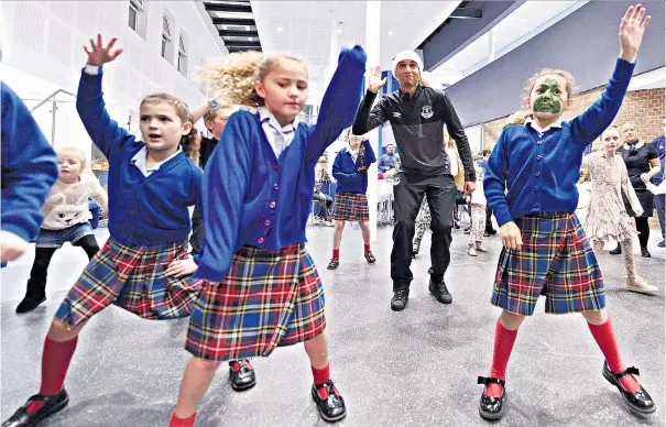  ??  ?? In step: Pupils at the Everton Free School are joined in a dance class by Brendan Galloway – ‘no child should ever be written off,’ is mantra of the school’s head, Richard Cronin