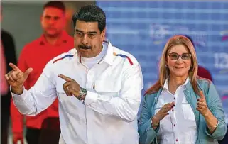  ?? ?? SITUACIÓN.
El presidente Nicolás Maduro y su señora Cilia Flores. Su eventual viaje causa reacciones.