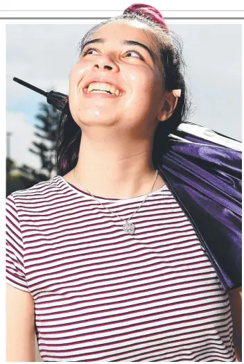  ?? Picture: ALIX SWEENEY ?? EYES ON THE SKIES: Xanthe Lamari, 15, is ready for the forecast rain.