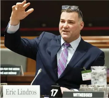  ?? ADRIAN WYLD/THE CANADIAN PRESS ?? Eric Lindros speaks at the House of Commons on concussion­s Wednesday.