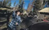  ?? Brian van der Brug Los Angeles Times ?? REPORTER Doug Smith works at the Golden Trout Pack Station in the Sequoia National Forest.