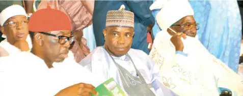  ?? PHOTO: PHILIP OJISUA ?? Delta State Governor and PDP Vice Presidenti­al Candidate, Ifeanyi Okowa ( left); Sokoto State Governor, Aminu Waziri Tambuwal and Emir of Ningi in Bauchi State, Yunusa Muhammadu Danyaya, during the Dr. Abubakar Olusola Saraki 10th memorial anniversar­y held in Abuja… yesterday.