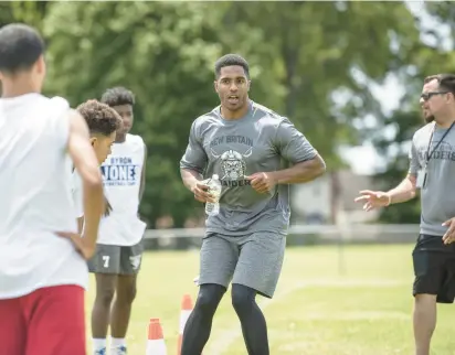  ?? COURTESY ?? Byron Jones has much to offer kids in his hometown of New Britain and was back to offer it Saturday.