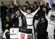  ?? ORLIN WAGNER — THE ASSOCIATED PRESS ?? Brad Keselowski celebrates in Victory Lane following the Monster Energy Cup race May 11 at Kansas Speedway in Kansas City, Kan.