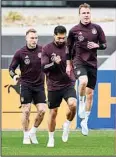  ?? ?? German players perform coordinati­on exercises during the national team’s training session at the DFB campus prior to the internatio­nal match between Germany and Peru, in Frankfurt, Germany. (AP)