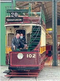  ?? RICHARD SYKES ?? Left: The Duke of Gloucester drives newly restored Newcastle tram No. 102 out of the depot at Crich.