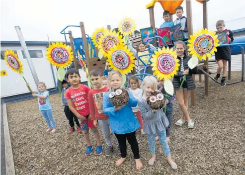  ?? Photo / Michael Cunningham ?? All kids have been working on a joint art installati­on of painted rocks, which will be on display in the school yard.