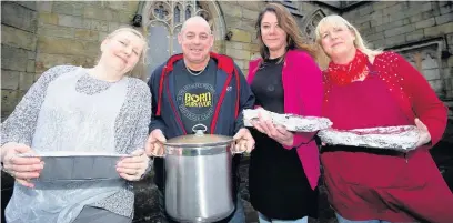  ?? ?? ●●Volunteers Liz Goodall, Dave Taylor, Michele Morgan and Julie Baxter at Feeding Rochdale Homeless’s new base St Chad’s Church