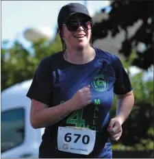  ??  ?? Lisa Tougher (Boyne AC) is all smiles as she crosses the finish line.