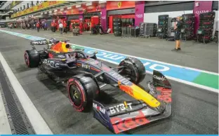  ?? ?? JEDDAH: Red Bull Racing’s Dutch driver Max Verstappen leaves after a pit stop during the qualifying session of the Saudi Arabia Formula One Grand Prix at the Jeddah Corniche Circuit. —AFP