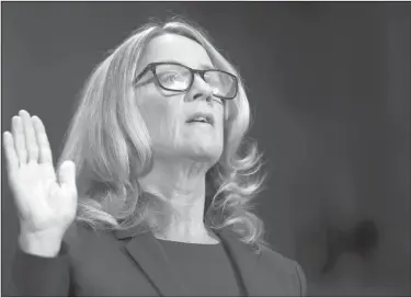  ?? Michael Reynolds/Pool Image via AP ?? Under oath: Christine Blasey Ford is sworn in before the Senate Judiciary Committee, Thursday, on Capitol Hill in Washington. The Senate Judiciary Committee will hear from Supreme Court nominee Brett Kavanaugh and Christine Blasey Ford, the woman who says he sexually assaulted her.