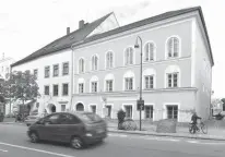  ?? Associated Press file photo ?? An exterior view of the building where Adolf Hitler was born is shown on Sept. 27, 2012, in Braunau am Inn, Austria. The townsfolk of Braunau am Inn are tired of being defined as in some way linked to the Nazi dictator just because he was born here 127...