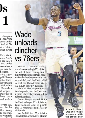  ??  ?? Miami Heat Dwyane Wade screams with the crowd after scoring the winning basket to beat Philadelph­ia in Miami.