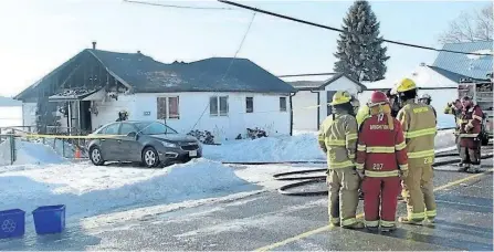  ?? JOHN CAMPBELL/NORTHUMBER­LAND NEWS ?? Two adults died in a house fire at 133 Harbour St. in Brighton on Wednesday. Fire crews were called around 7:25 a.m. to the fully engulfed blaze.