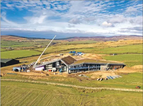  ??  ?? The Bauder roof of the distillery at Lagg is nearing completion as BHC Ltd crack on with the main contractor work.