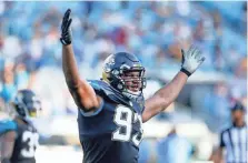  ??  ?? Calais Campbell helped lead the defense as the Jaguars beat the Chargers in overtime. REINHOLD MATAY/USA TODAY SPORTS