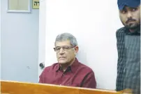  ?? (Avshalom Sassoni/Maariv) ?? MIKI GANOR, ThyssenKru­pp’s representa­tive in Israel, waits at the Rishon Lezion Magistrate’s Court on Tuesday.