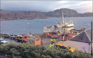  ??  ?? The damaged fish farm support vessel Sordyroy will remain moored at Tarbert Harbour while repairs take place.