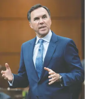  ?? ADRIAN WYLD / THE CANADIAN PRESS FILES ?? Finance Minister Bill Morneau will table a fiscal “snapshot” on Wednesday, providing the first glimpse of the federal government’s outlook for the Canadian economy since the coronaviru­s pandemic struck in March.
