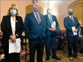  ?? AP ?? House lawmakers Rep. Laura Lanese, R-Grove City, Rep. DaveGreens­pan, R-Westlake, Rep. Michael Skindell, D-Lakewood, and Rep. MichaelO’Brien, D-Warren, testify before theHouse Select Committee on Energy Policy and Oversight. The committeew­as set to have its third hearingWed­nesday, but lawmakers are failing to agree on howto repeal the bill as the deadline before the lawgoes into effect looms over the Statehouse.