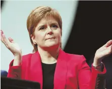  ?? JANE BARLOW/PRESS ASSOCIATIO­N PHOTO VIA AP ?? WHY NOT? Scottish National Party First Minister Nicola Sturgeon said yesterday she is open to a new Brexit vote.