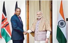  ??  ?? Prime Minister Narendra Modi shakes hands with President of the Republic of Kenya Uhuru Kenyatta before a meeting at Hyderabad House, in New Delhi on Wednesday