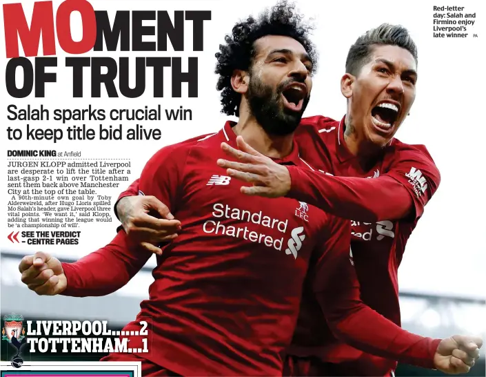  ?? PA ?? Red-letter day: Salah and Firmino enjoy Liverpool’s late winner