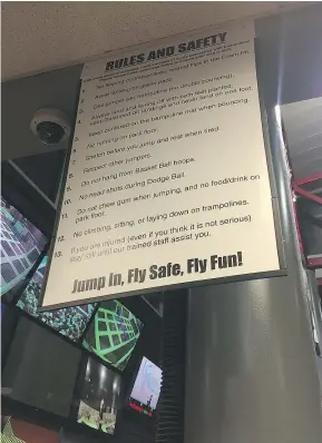  ??  ?? A sign hanging inside Extreme Air Park in Richmond on Jan. 20 displays the indoor trampoline park’s rules and safety regulation­s.