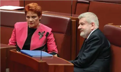  ??  ?? Pauline Hanson with communicat­ions minister Mitch Fifield. The Coalition’s proposed changes to the ABC Act are part of a deal it made with One Nation in exchange for passing its overhaul of media laws. Photograph: Mike Bowers for the Guardian