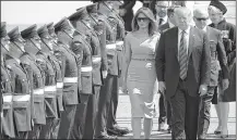  ??  ?? US President Donald Trump (R) and US First Lady Melania Trump (L) at Stansted Airport, north of London on Thursday. AFP