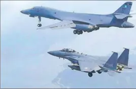  ?? AP ?? A US Air Force B1B bomber flew with South Korean fighter jets over South Korea on Sunday.