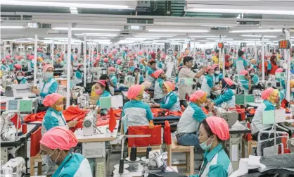  ?? Bloomberg/Getty Images ?? Rights group, says major clothing brands should be considered joint employers, along with theirsuppl­iers. Photograph: Muhammad Fadli/