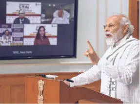  ??  ?? PRIME MINISTER Narendra Modi launching the auction process of coal blocks through videoconfe­rence in New Delhi on June 18.