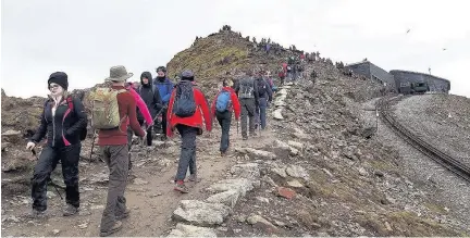  ??  ?? A crowded Snowdon summit on the first day of the 2017 May Bank Holiday