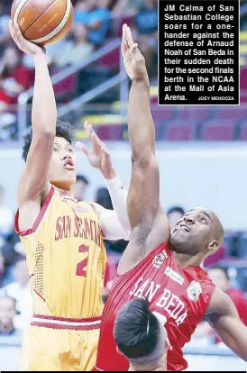  ?? JOEY MENDOZA ?? JM Calma of San Sebastian College soars for a onehander against the defense of Arnaud Noah of San Beda in their sudden death for the second finals berth in the NCAA at the Mall of Asia Arena.