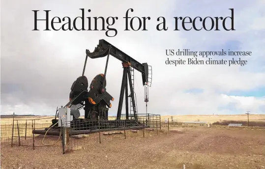  ?? MEAD GRUVER/ASSOCIATED PRESS ?? An oil well is seen east of Casper, Wyo. Federal officials have approved thousands of new oil and gas drill permits since President Joe Biden took office in January, disappoint­ing environmen­talists who want a ban against drilling on federal lands.